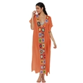 Detailed view of handmade crochet floral patchwork and deep V-neckline on orange beach dress - One Size / Tops / Orange