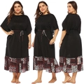 Detail view of plus size black dress showing batwing sleeves and ethnic print patchwork - 0XL / Black