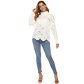 Women's cream knit hollow sweater with wavy texture paired with slim blue jeans - White