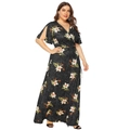 Detailed view of plus size V-neck dress with tropical lily print and high waist cut - Black
