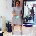 Elegant grey pleated A-line dress for women featuring chic 3/4 sleeves and a round neck design - Gray