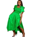 Detail of green high-low dress showing oversized bow straps and smocked bodice texture - S / Green