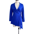 Detail of royal blue wrap-style long sleeve top with notch lapel and side tie closure - S / Blue