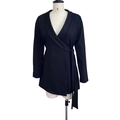 Detail of black wrap blazer dress featuring a shawl lapel and adjustable waist tie belt - S / Black