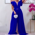 Detail of royal blue jumpsuit showing deep V-neck, ruffle shoulders and gold buckle belt - Sapphire Blue