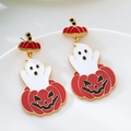 Macro detail of ghost and pumpkin earrings with gold plating and drip glaze finish - Red Pumpkin and Ghost Drop Earrings