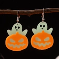 Detail of Halloween ghost and pumpkin acrylic earrings hanging on a rustic branch - Green Ghost & Orange Pumpkin Earrings (11)
