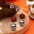 Halloween Geist und Kürbis Ohrstecker Set präsentiert auf hölzernen Hintergründen - Geister-Kürbis-Fledermaus-Set