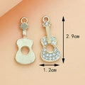 Golden alloy guitar pendant with small rhinestones and size dimensions of 2.9cm by 1.2cm - 1.2CM×2.9CM / Guitar KC Gold