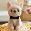 Close-up of a cute French Bulldog plush toy with a black polka-dot bowtie on a straw mat - 23CM / French Bulldog Grey