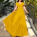 Detail of a bright yellow pleated V-neck maxi dress with ruffled sleeves and belted waist - S / Yellow