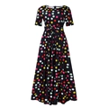 Détail d'une robe maxi vintage noire à pois avec manches courtes et nœud à la taille - Pois Colorés