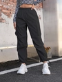 Pantaloni cargo neri da donna a vita alta con elastico e ampie tasche laterali stile street - S / Nero