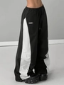Détail du pantalon large bicolore avec taille élastique et cordon de serrage - S / Noir