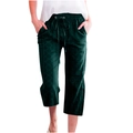 Detail of dark green casual drawstring pants with subtle geometric diamond patterns - S / Dark Green