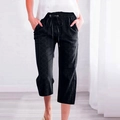 Detail of black drawstring waist and textured jacquard fabric on women's cropped pants - S / Navy Blue