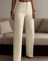 Detail of high waisted pleated trousers in cream white with smooth textured fabric - S / Apricot