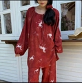 Detail of floral and horse print pajamas with lace-up neckline and elastic cuffs - Dark Red Horse Print