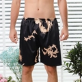 Men's silk satin lounge shorts in black featuring golden dragon and phoenix patterns - M / Black Dragon