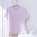 Close-up of light purple V-neck pajama top showing linen-like fabric texture and size L label - Lavender Purple