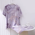 Detail view of purple floral cotton pajamas set with V-neck top and drawstring shorts - One Size / Top And Bottom / Purple Abstract Floral