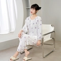 Close-up of floral print cotton pajamas set with long sleeves and elastic pants - M / Purple Petal