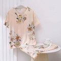 Detail of floral V-neck top and matching drawstring shorts in soft peach silk fabric - One Size / Top And Bottom / Light Pink Large Floral
