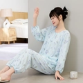 Floral cotton pajama set featuring long sleeves with elastic cuffs in a cozy bedroom setting - M / Blue Four-leaf Flower