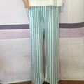Detail shot of blue and white vertical striped wide-leg trousers with side pockets - One Size / Blue White Stripes