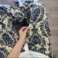Detailed texture of cotton pajama pants with blue damask print on beige fabric - Chinese Style Lion