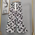 Women's wide leg pajama pants with elegant black and white rose floral print - Black