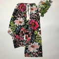 Women's wide-leg floral pajama pants in black with pink sunflowers and elastic waist - Black With Rose