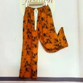 Women's cotton sleep pants in caramel orange featuring black bamboo leaf print - Pumpkin Bamboo