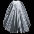 Close-up of white layered bridal veil with delicate pearl accents on fine mesh tulle fabric - Overlocked Pearl Style (TS007)