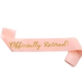 Pink satin 'Officially Retired!' party sash with gold foil lettering for women - Champagne with Gold Letters