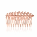 Detail showing rose gold leaf hair comb with textured veins and polished metal finish - Rose Gold