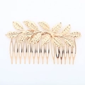 Close-up of golden leaf hair comb with detailed textures and polished metallic finish - fs004 Gold Hair Comb