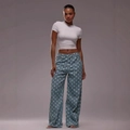 Pantaloni jeans larghi da donna in azzurro con pois bianchi e vestibilità casual ampia - S / Azzurro