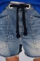 Close-up of blue denim shorts with paint splatters, metal eyelets and rope drawstring - Deep Blue Splatter