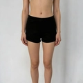 Detail of high-waisted black slim fit stretch denim shorts for women in plain black - S / Black
