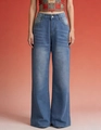 Detail of high-waisted wide-leg blue denim jeans with natural vintage washed texture - XS / Blue