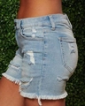 Women's light blue distressed denim shorts with ripped holes and frayed tassel hem - S / Light Blue