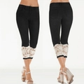Detailed views of black cropped leggings featuring white lace trim on the bottom cuffs - S / Black