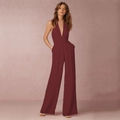 Detailed view of elegant wine red halter neck jumpsuit with wide-leg trousers - S / Red