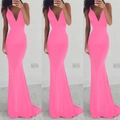 Detail of neon pink backless mermaid dress with deep V-neck and slim fit silhouette - Pink