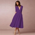 Detail view of purple deep V-neck dress featuring mid-sleeves and elegant A-line skirt - Purple
