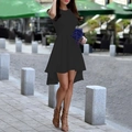 Detail of elegant black crew neck high-low dress with a stylish asymmetric hemline - Black