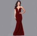 Detailed view of the deep red mermaid evening gown with thin straps and a plunging V-neckline - S / Burgundy