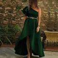 Detail of dark green one-shoulder evening dress with ruffled neckline and silver floral belt - S / Green
