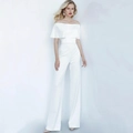 Elegante tuta bianca con spalle scoperte, scollo a balze e gamba ampia a palazzo - S / Bianco